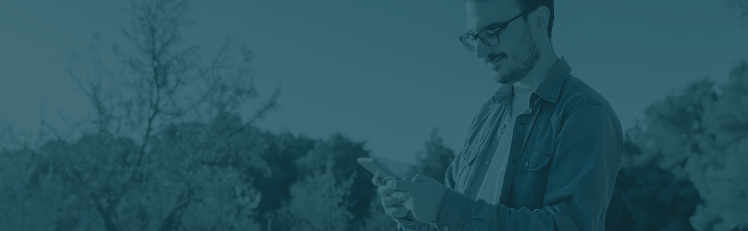 Man receiving a mobile notification from his cellular sensor 