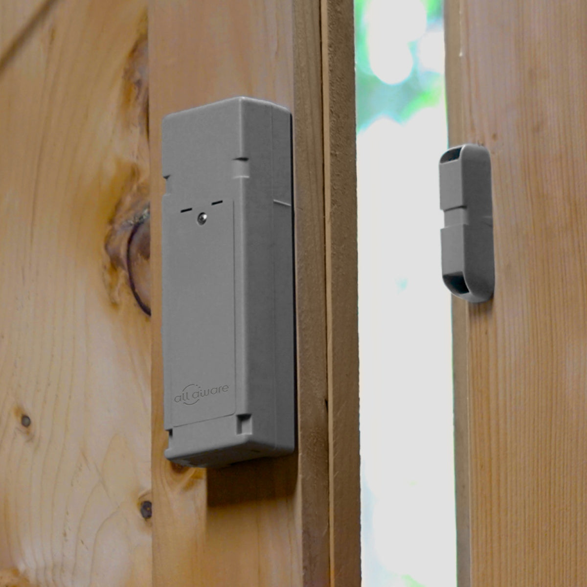 Cellular contact sensor installed on wooden door